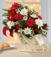 Christmas Flowers in Sleigh Vase